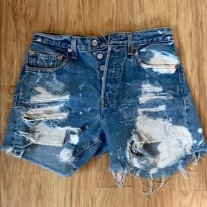 Levi’s distresses, bleached cut offs.